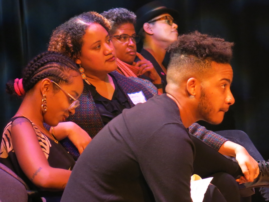 Students watch attentively as speakers present at Interventions 2020